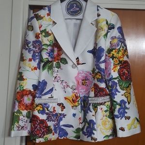 Floral jacket and whte skirt.